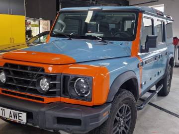 Ineos Grenadier accente portocalii și protecție PPF
